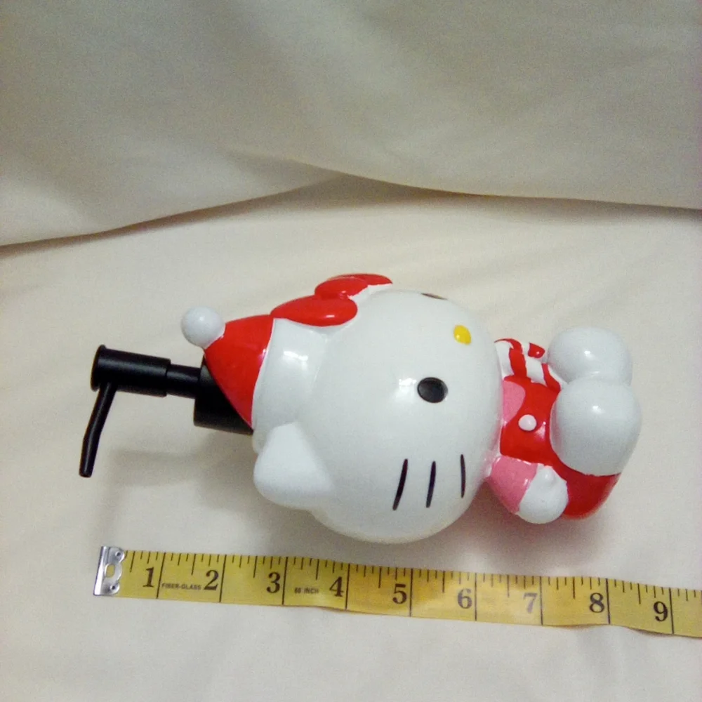 Hello Kitty Santa Hat with a Candy Cane
